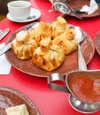 Fried khinkali on a red table Royalty Free Stock Photo
