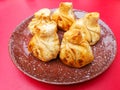Fried khinkali on a red table Royalty Free Stock Photo