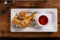 Fried lamb chops in parmesan batter with tomato sauce Royalty Free Stock Photo