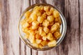 Fried lard cracklings on a wooden rustic background Royalty Free Stock Photo