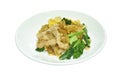 fried large noodle with slice soft marinated pork and Chinese kale in sweet black soybean sauce on plate