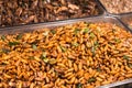 Fried larvas at night market in thailand