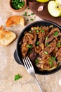 Fried liver with onions and apples