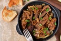 Fried liver with onions and apples