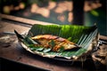 Fried mackerel on banana leaf, thai style food
