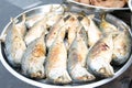 Fried mackerel fish for on a stainless plate for sell at Bang Lampu market, Bangkok, Thailand