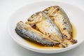 Fried mackerel on white plate. Deep fried fish