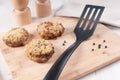 Fried meat cutlets (patties) with spatula