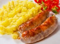 Fried meat sausages with mashed potatoes and vegetables salad Royalty Free Stock Photo