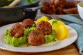 Fried meatballs with potatoes and green pea puree Royalty Free Stock Photo