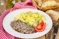 Fried minced beef in white creamy sauce in German style