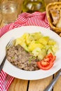 Fried minced beef in white creamy sauce in German style