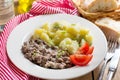 Fried minced beef in white creamy sauce in German style