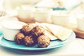 Fried minced meat with sauce and tortillas, traditional Greek lunch on a blue plate in a restaurant