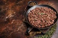 Fried mincemeat, cooked forcemeat in a plate. brown background. top view Royalty Free Stock Photo