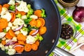 Fried mix vegetables in a pan in oil Royalty Free Stock Photo