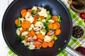 Fried mix vegetables in a pan in oil Royalty Free Stock Photo