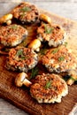 Fried mushroom burgers with onion on a plate. Homemade mushroom cutlets Royalty Free Stock Photo