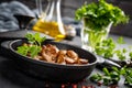 Fried mushrooms, champignons in pan Royalty Free Stock Photo