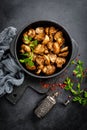 Fried mushrooms, champignons in pan Royalty Free Stock Photo