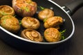 Fried mushrooms in a pan Royalty Free Stock Photo