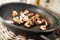Fried mushrooms in a pan Royalty Free Stock Photo