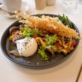 Fried mushrooms with poached egg Royalty Free Stock Photo