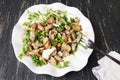 Fried mushrooms with vegetables on a plate Royalty Free Stock Photo