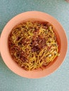 Fried noodles, delicious, savory, sweet, plus fried onions.