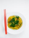 Fried noodles with red chopstick in white plate on white backgro Royalty Free Stock Photo