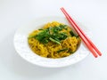 Fried noodles with red chopstick in white plate on white backgro Royalty Free Stock Photo