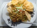 fried noodles with stir-fried vegetables, crackers, sausage