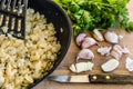 Fried onion in the pan.