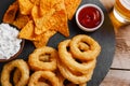 Fried onion rings in batter with sauce chips Royalty Free Stock Photo