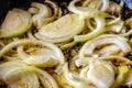 Fried onions in a frying pan. Roasting the chopped onion in oil. Royalty Free Stock Photo