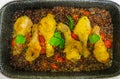 Fried in the oven crispy chicken legs with gray peas Royalty Free Stock Photo