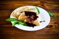 Fried pancakes thin on a white plate Royalty Free Stock Photo