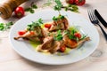 Fried partridge on a white plate