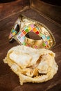 Fried pastry of italian carnival with venetian mask.