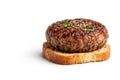 Fried patty on a slice of bread on a white background. Space for text. Royalty Free Stock Photo