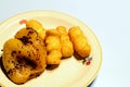 Fried pepper in oil with croquettes