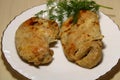 Fried pieces of chicken in a plate on the table. Royalty Free Stock Photo