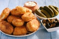 Fried pies on wooden table, russian style cuisine.