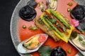 Fried pike-perch fillet with mussels and asparagus Royalty Free Stock Photo