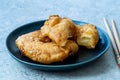 Fried Pineapple Fritters Caramelized with Cinnamon and Sesame Seeds