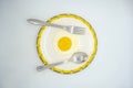 A fried poached egg with yellow poached egg on a plate ready to eat delicious