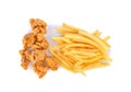 Fried popcorn chicken and french fries isolated on white background.