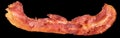 Fried Pork Bacon Rasher Isolated on Black Background Royalty Free Stock Photo