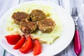 Fried pork chops boiled potatoes tomatoes Royalty Free Stock Photo