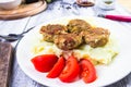 Fried pork chops boiled potatoes tomatoes Royalty Free Stock Photo